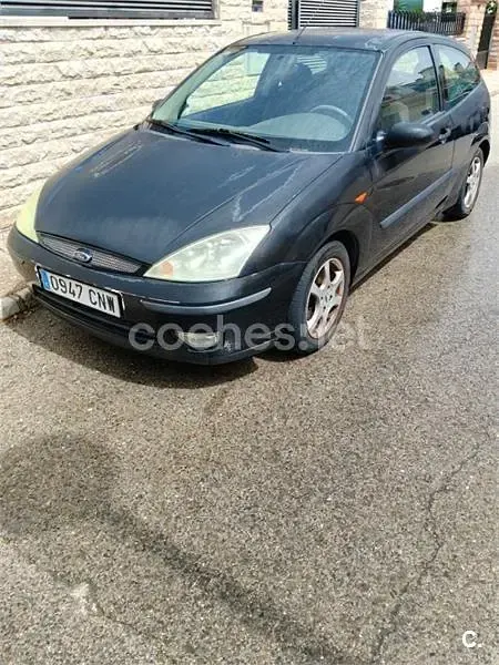 Usado Ford Focus Trend 100 CV (73 kW) 2003 Negro Berlina