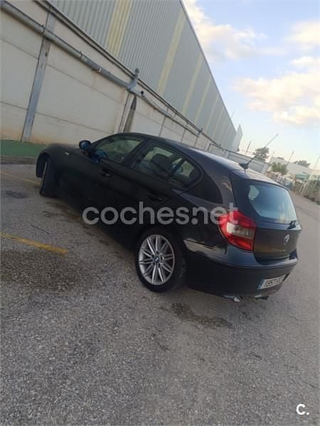 Usado BMW 120 163 CV (119 kW) 2006 Negro Utilitario