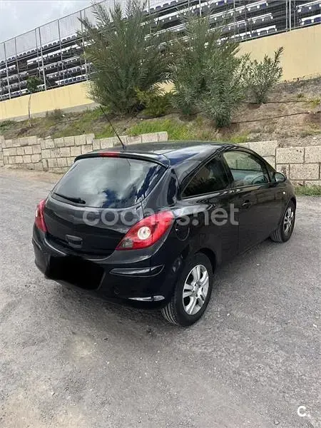 Usado Opel Corsa 85 CV (62 kW) 2011 Negro Utilitario