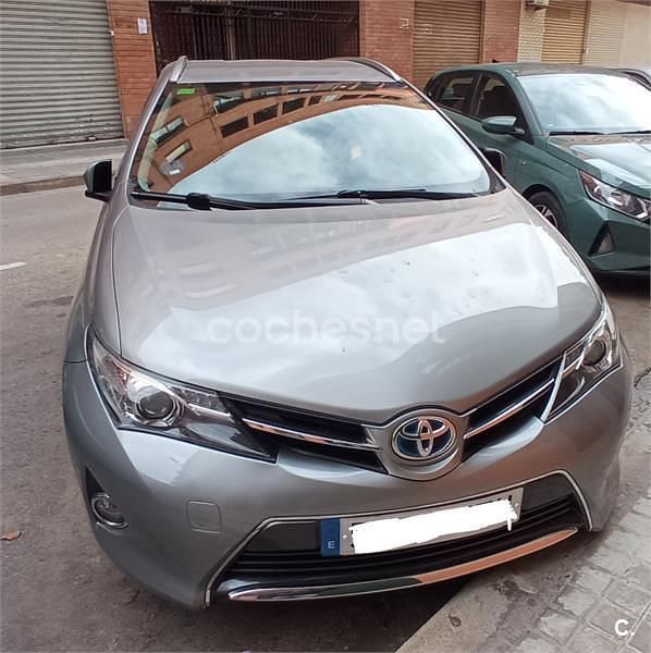 Gris / plata Usado 2014 Toyota Auris Hybrid Advance Familiar | 15.500 € (Un poco caro) - Imagen 1/4
