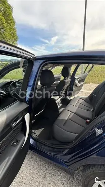 Usado BMW 118 Sport Line 170 CV (125 kW) 2013 Azul Utilitario