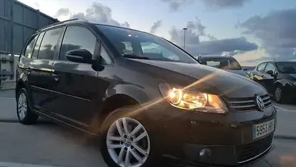 Używany VW Touran Advance 105 KM (77 kW) 2013 Czarny Minivan