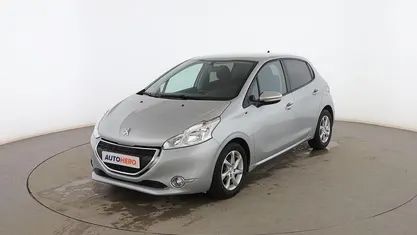 Usado Peugeot 208 Style 92 CV (67 kW) 2014 Gris Utilitario