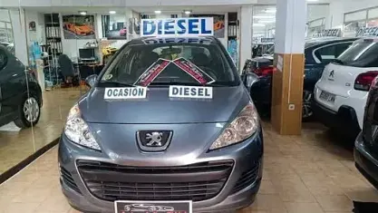Usado Peugeot 207 92 HP (67 kW) 2010 Cinzento Sedan