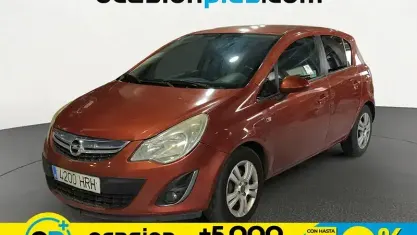 Usado Opel Corsa Expression 86 CV (63 kW) 2013 Naranja Utilitario