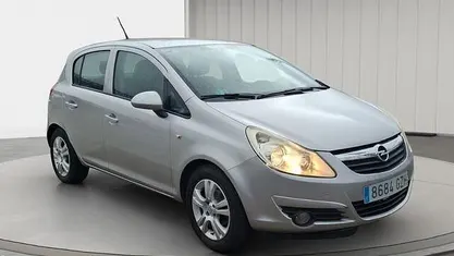 Usado Opel Corsa 86 HP (63 kW) 2010 Cinzento Sedan