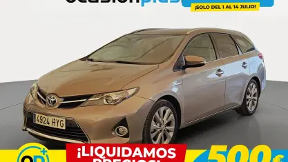 Usado Toyota Auris Hybrid Active 136 CV (100 kW) 2014 Marrón Familiar
