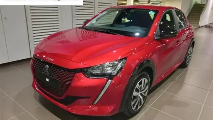 Rojo elixir Usado 2023 Peugeot e-208 Active Utilitario | 21.990 €