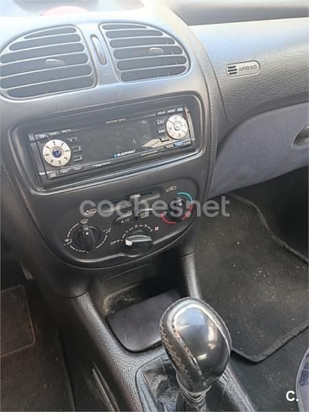 Usado Peugeot 206 75 CV (55 kW) 1999 Azul Berlina
