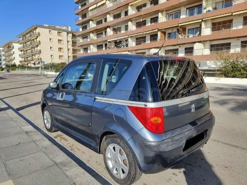Usado Peugeot 1007 75 CV (55 kW) 2005 Gris / plata Monovolumen