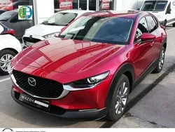 Rojo Nuevo 2024 Mazda CX-30 Exclusive-Line SUV | 29.690 € (Precio justo)