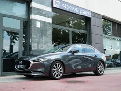 Gris / plata Usado 2024 Mazda 3 Exclusive-Line Berlina | 27.900 € (Un poco caro)