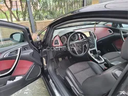 Amarillo Usado 2012 Opel Astra GTC Sportive Berlina | 6900 € (Precio justo)