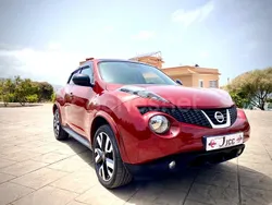 Granate Usado 2013 Nissan Juke Tekna SUV | 9490 € (Precio justo)