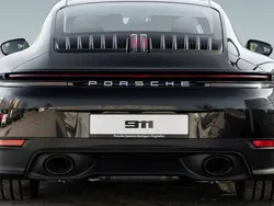 Negro Nuevo 2025 Porsche 911 Carrera Coupe | 192.900 € (Precio justo)