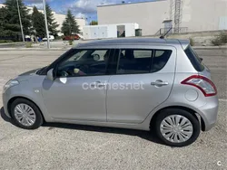 Gris / plata Usado 2015 Suzuki Swift GL Berlina | 6900 € (Un poco caro)