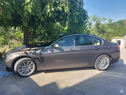 Beige Usado 2014 BMW 318 Comfort Edition Berlina | 18.000 €