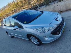 Gris Usado 2011 Peugeot 308 SW Sportium Familiar | 5800 €