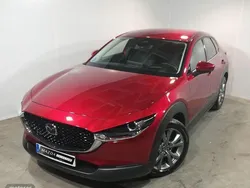 Granate Usado 2024 Mazda CX-30 Exclusive-Line SUV | 29.790 € (Un poco caro)