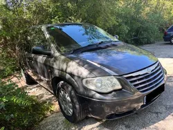 Gris / plata Usado 2004 Chrysler Voyager Monovolumen | 3999 € (Precio justo)