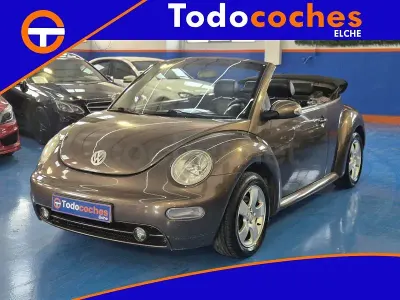 Usado VW New Beetle 100 CV (73 kW) 2003 Marrón Utilitario