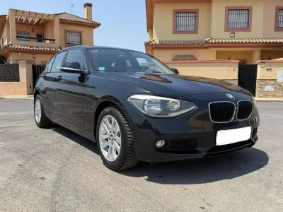 Usado BMW 116 116 CV (85 kW) 2013 Negro Utilitario