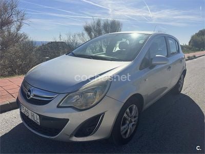 Usado Opel Corsa 75 CV (55 kW) 2012 Gris / plata Berlina