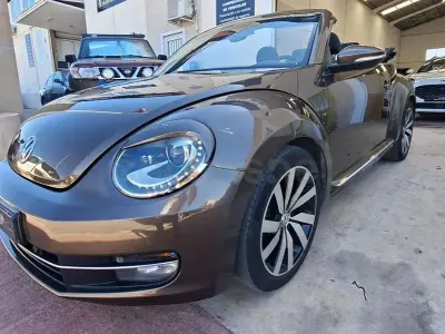 Usado VW Beetle Design 105 CV (77 kW) 2013 Marrón Utilitario