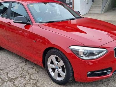 Usado BMW 116 Sport Line 136 CV (100 kW) 2012 Rojo Utilitario