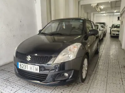 Usado Suzuki Swift GLX 75 CV (55 kW) 2013 Negro Utilitario
