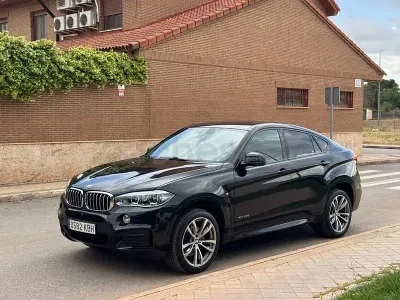 Käytetty BMW X6 313 HP (230 kW) 2018 Musta Katumaasturi