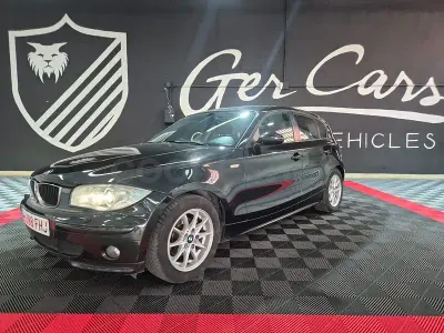Usado BMW 118 122 CV (89 kW) 2006 Negro Utilitario