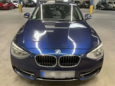 Usado BMW 116 Sport Line 136 CV (100 kW) 2012 Azul Utilitario