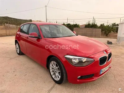 Usado BMW 116 122 CV (89 kW) 2012 Rojo Utilitario