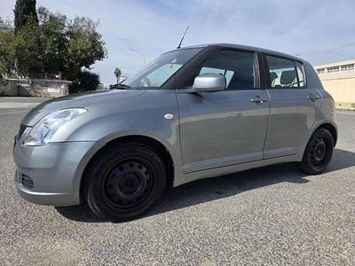 Usado Suzuki Swift GL 92 CV (67 kW) 2005 Gris / plata Utilitario