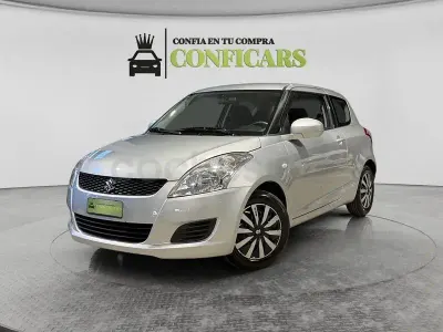 Usado Suzuki Swift 95 CV (69 kW) 2013 Gris / plata Utilitario