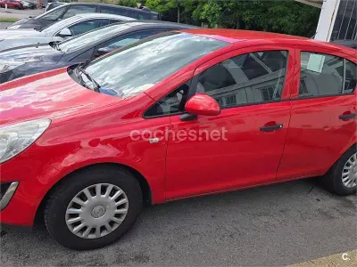 Begagnad Opel Corsa Selective 75 HK (55 kW) 2011 Röd Halvkombi