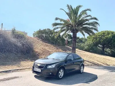 Usado Chevrolet Cruze LT 124 CV (91 kW) 2012 Negro Berlina