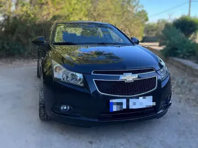 Usado Chevrolet Cruze LT 150 CV (110 kW) 2010 Negro Utilitario