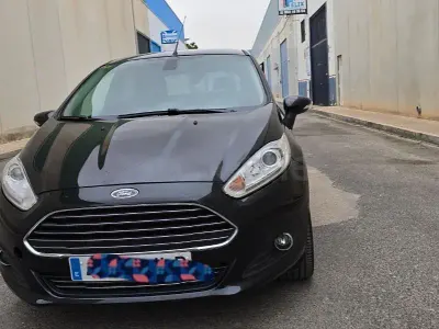 Usado Ford Fiesta Titanium 100 CV (73 kW) 2016 Negro Utilitario