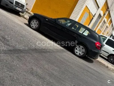 Usado BMW 118 129 CV (94 kW) 2007 Negro Utilitario