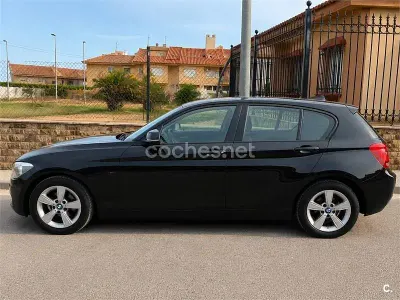 Usado BMW 116 Sport Line 136 CV (100 kW) 2012 Negro Utilitario