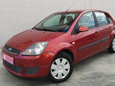 Usado Ford Fiesta 70 CV (51 kW) 2008 Naranja Utilitario