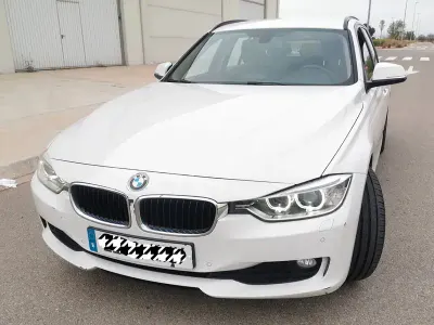 Begagnad BMW 320 184 HK (135 kW) 2013 Vit Kombi