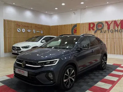 Usado VW Taigo R-line 150 CV (110 kW) 2023 Gris / plata SUV