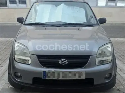 Usado Suzuki Ignis 69 CV (50 kW) 2006 Gris / plata Utilitario