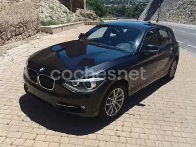 Usado BMW 118 Sport Line 170 CV (125 kW) 2012 Negro Utilitario