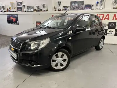 Usado Chevrolet Aveo LS 84 CV (61 kW) 2012 Negro Utilitario