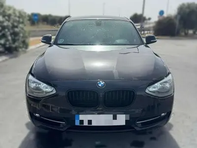 Usado BMW 118 M Sport 143 CV (105 kW) 2012 Negro Utilitario