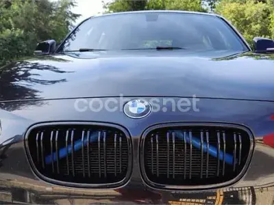 Usado BMW 118 Sport Line 143 CV (105 kW) 2012 Negro Utilitario